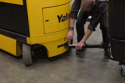 Vestil TDT-TB-100-HD-BL tilt trucks with tow-bar shown from an alternate angle